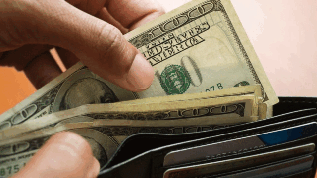 A budget planning sheet with Japanese yen notes, travel items, and a map of Japan
