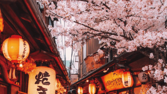 Japan travel itinerary planning basics with a notebook, calendar, and Japan map on a desk